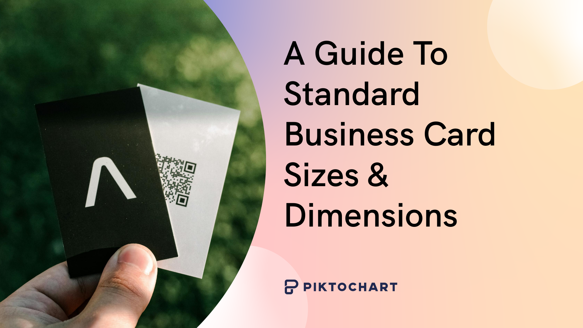 featured image of a piktochart article about business card dimensions and sizes, picture of a hand holding a black and a white business card