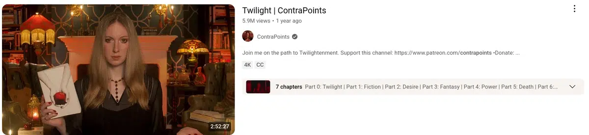 a youtube thumbnail featuring a woman in a dark room holding a white envelope with a red apple on it, with the video title "twilight, contrapoints"